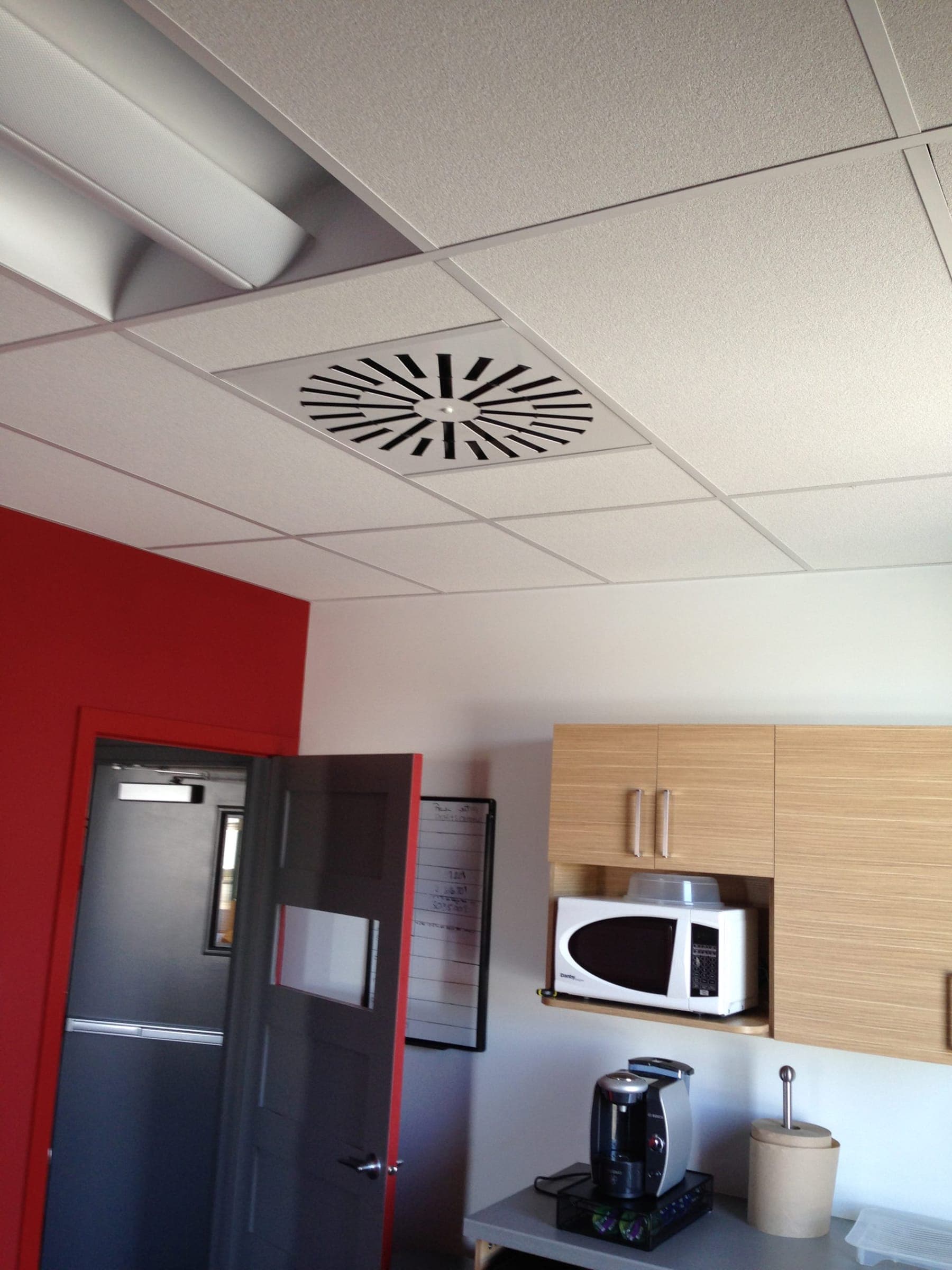 Ceiling diffuser in an office kitchen area